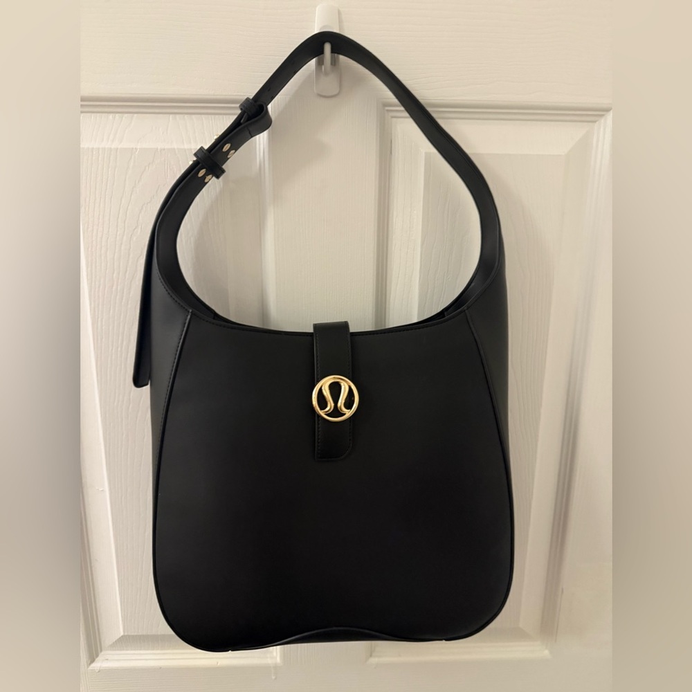lululemon athletica Black Shoulder Bag with Gold Accent